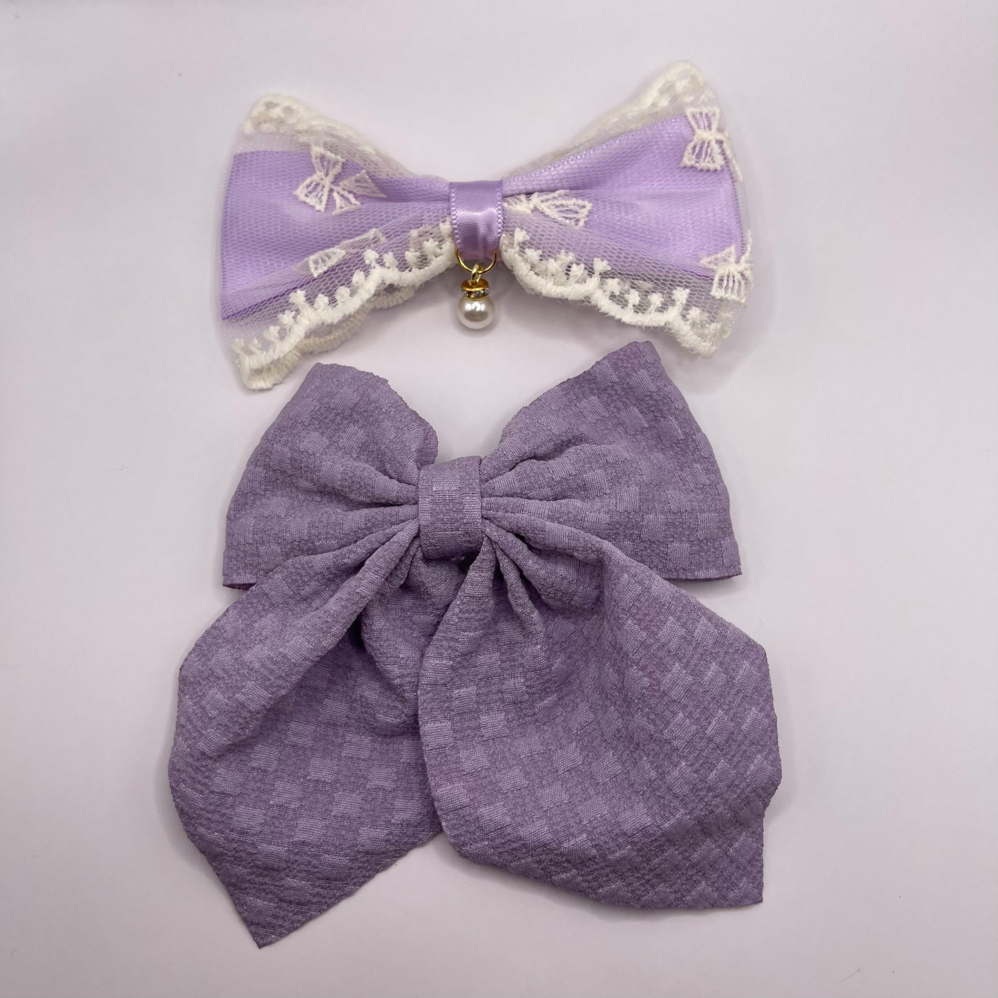 Two bows with pearl (purple)