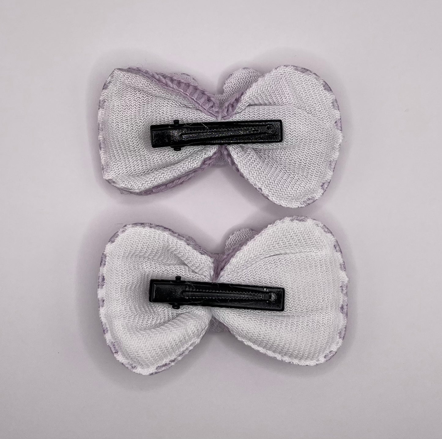 Two baby Minnie bows (purple)