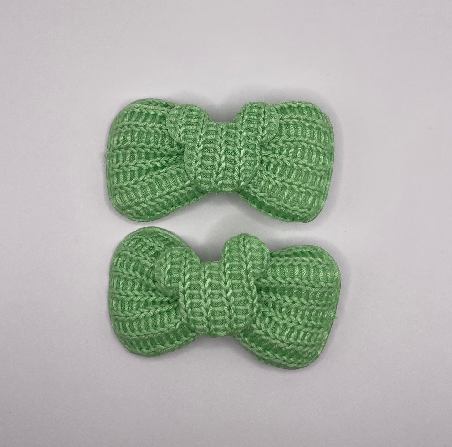 Two baby Minnie bows (green)