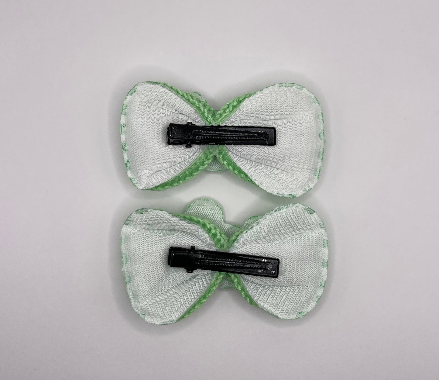 Two baby Minnie bows (green)