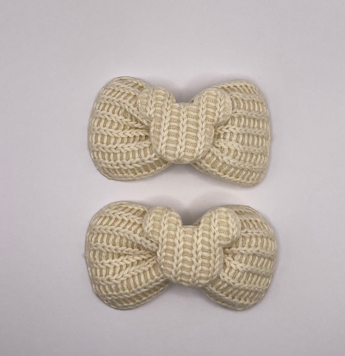 Two baby Minnie bows (beige)