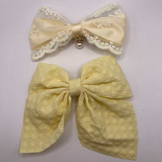 Two bows with pearl (yellow)